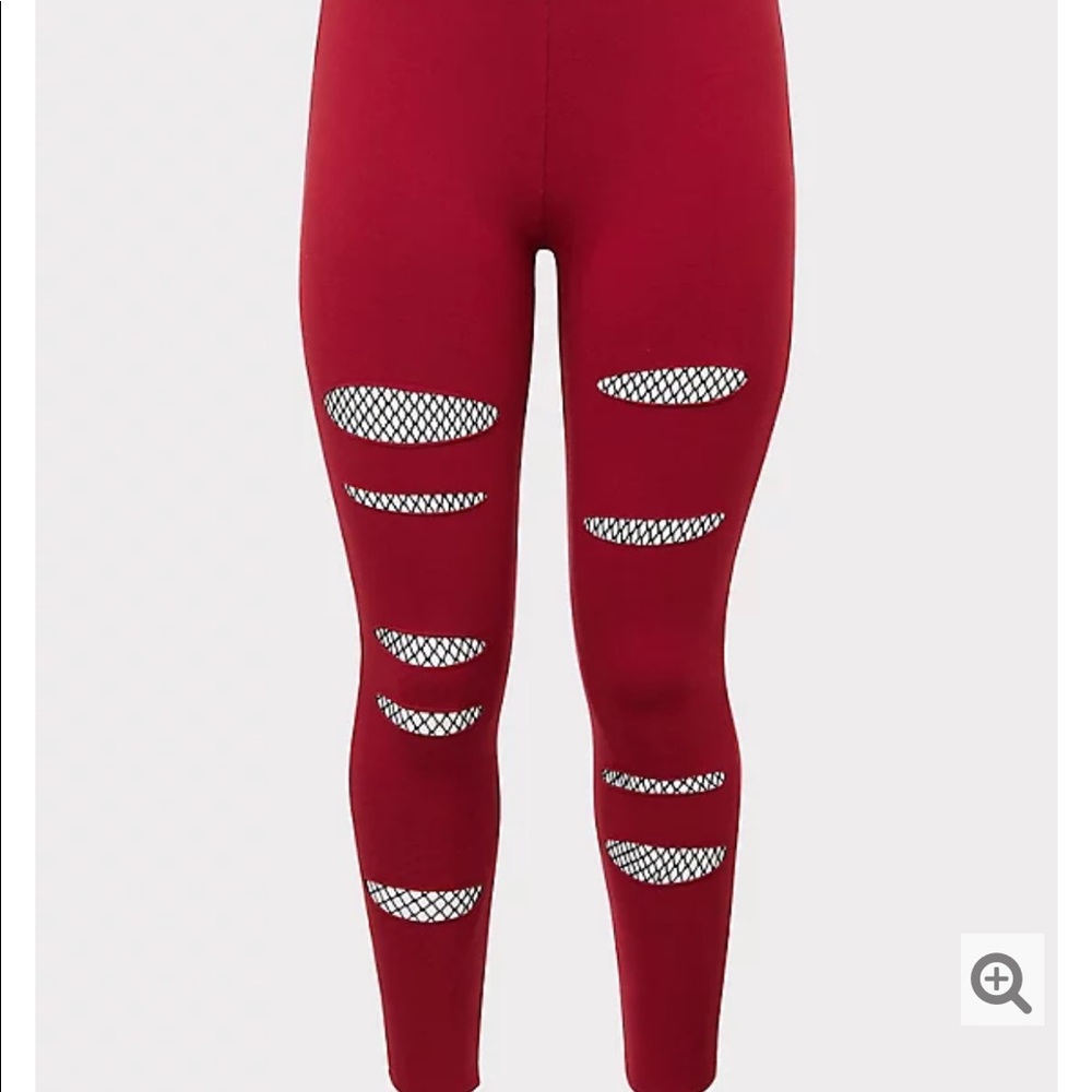 Slashed fishnet red leggings